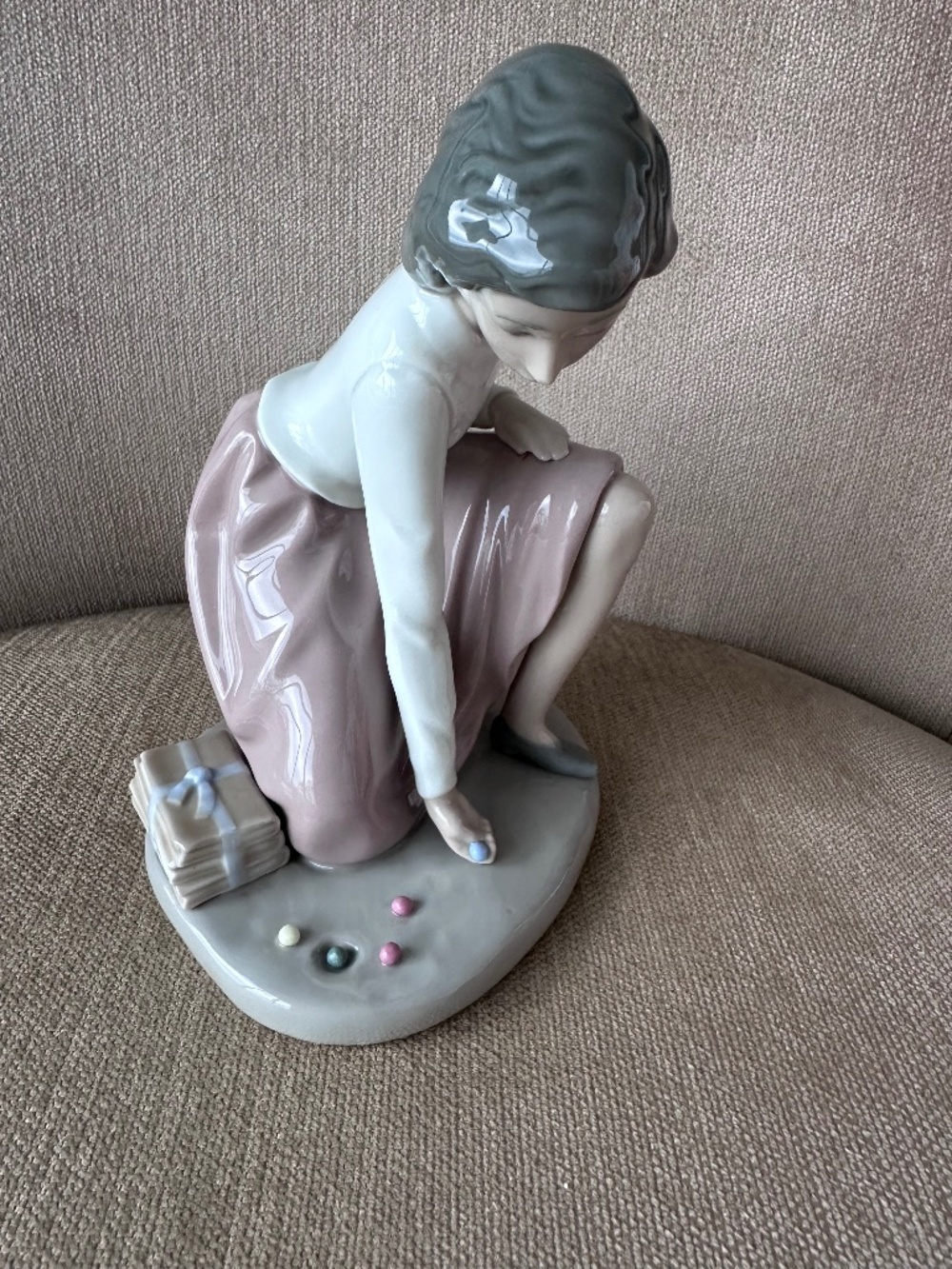 NAO. Girl playing with marbles.  Made in Spain 1982